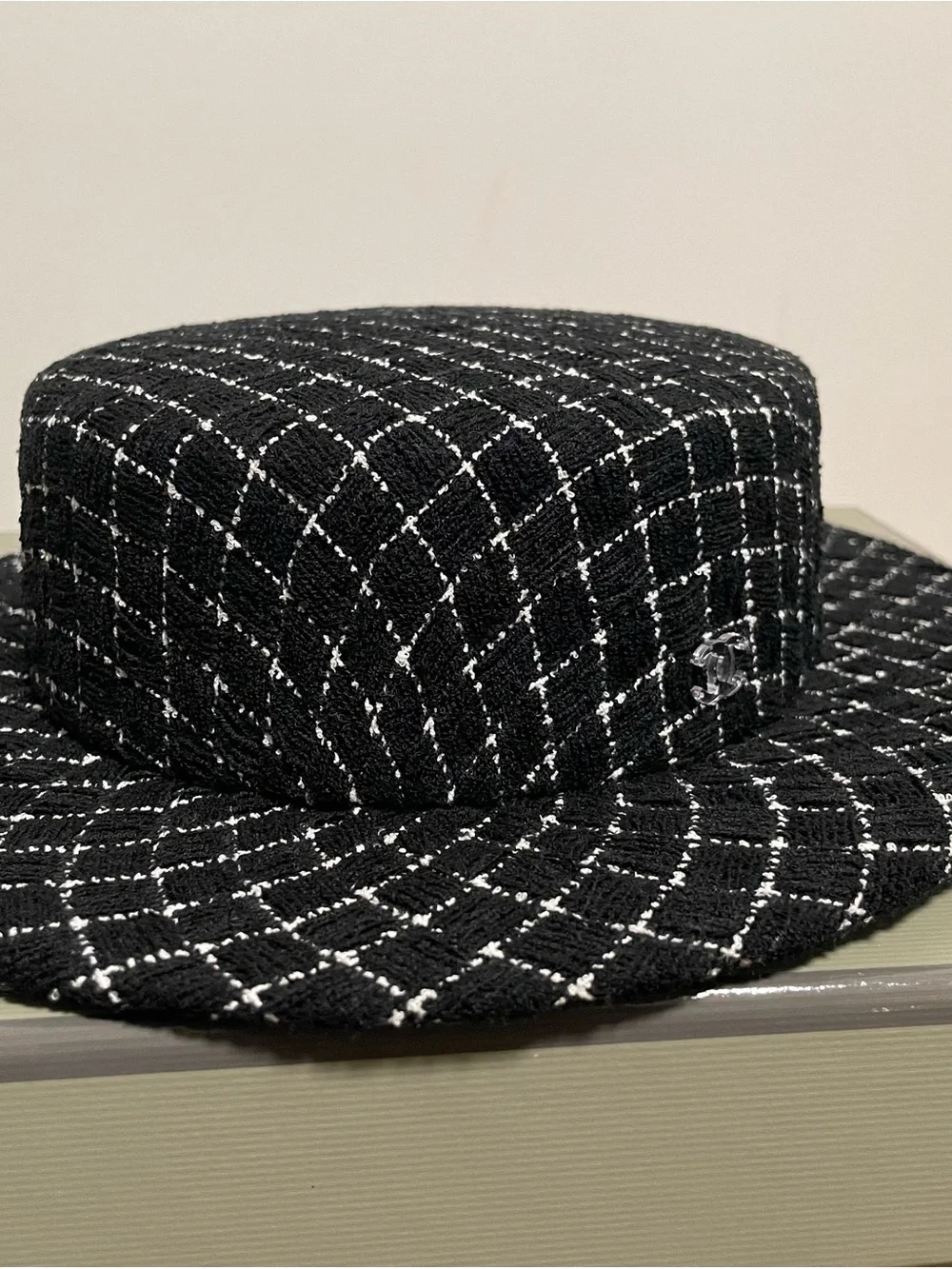 CHANEL Black Tweed Bowler with White Grid Stitching and Clear CC Pin
